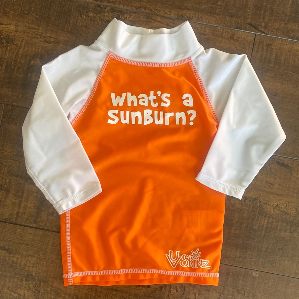 Never worn UV Skinz long sleeve shirt Rashguard